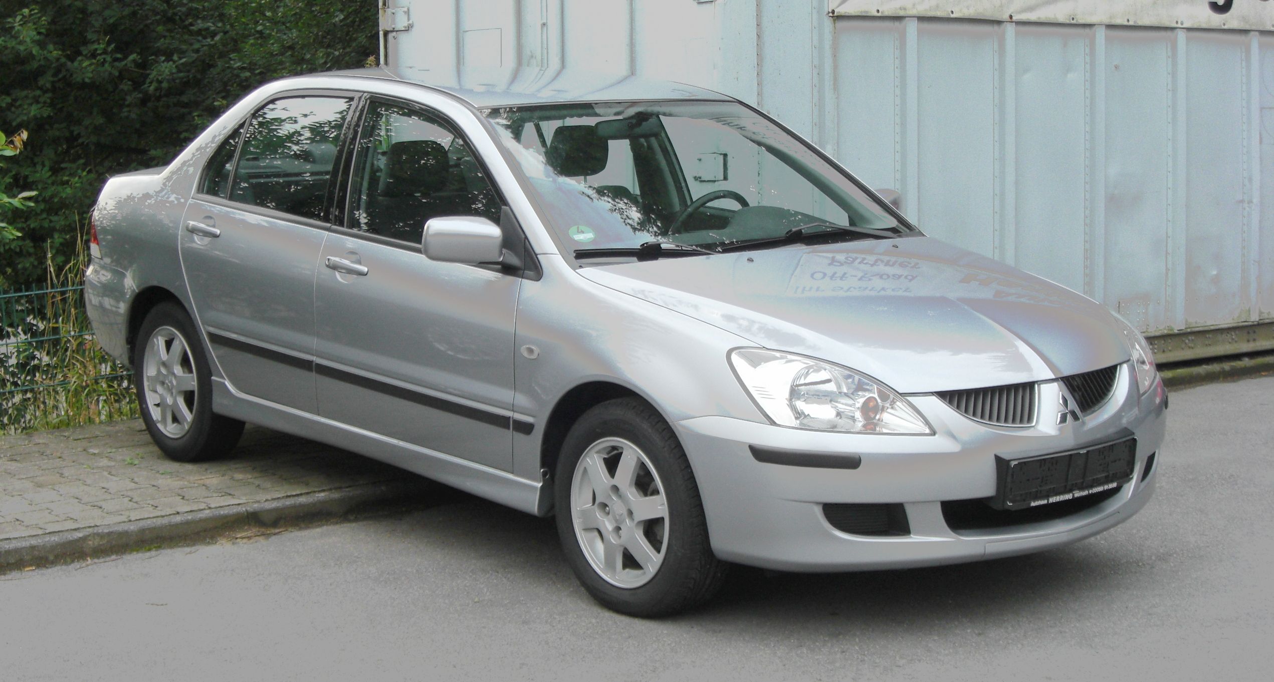 Mitsubishi lancer 2003 года